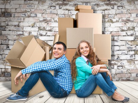 Household items and moving equipment ready for a Canning Town removal