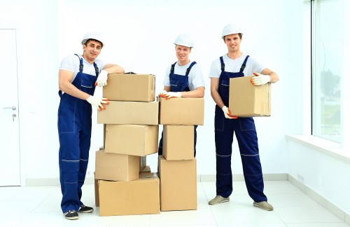 Commercial moving crew handling desks and IT equipment in Canningtown