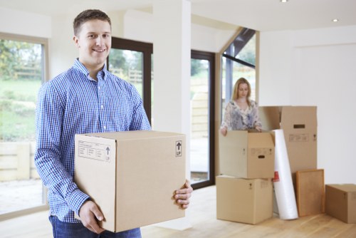 Boxes and furniture loaded into a removal van for transport